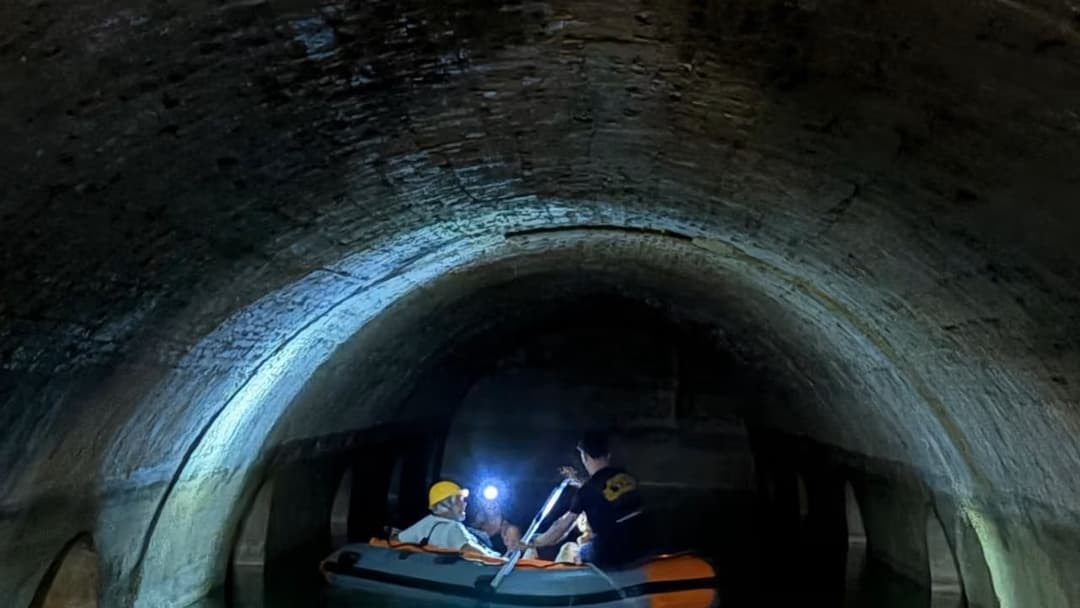 Guided inflatable boat tour of the cisterns at Sant Ferran Castle